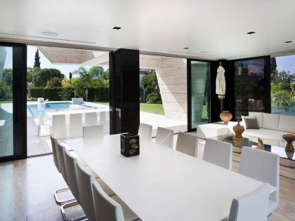 A Stylish Contemporary Concrete House with Black Glass and Marble Facade in Seville by A-cero (40)