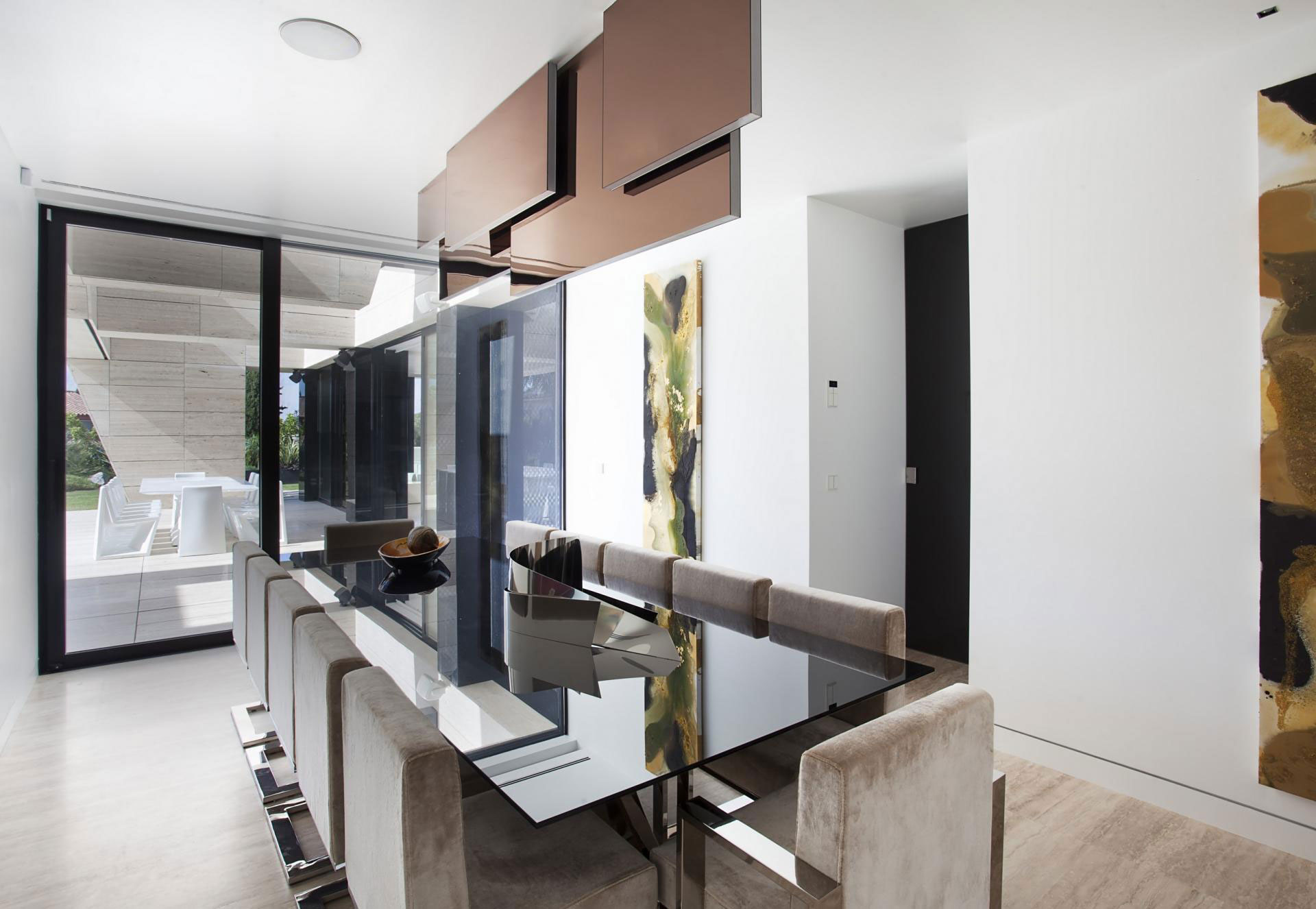 A Stylish Contemporary Concrete House with Black Glass and Marble Facade in Seville by A-cero (41)