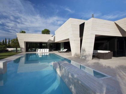 A Stylish Contemporary Concrete House with Black Glass and Marble Facade in Seville by A-cero (5)