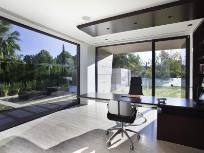 A Stylish Contemporary Concrete House with Black Glass and Marble Facade in Seville by A-cero (53)