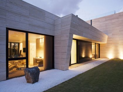 A Stylish Contemporary Concrete House with Black Glass and Marble Facade in Seville by A-cero (54)