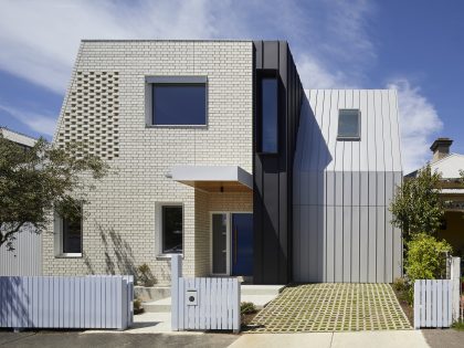 A Sustainable Contemporary Home with Warm Interiors for a Young Family in Melbourne, Australia by Poly Studio (1)