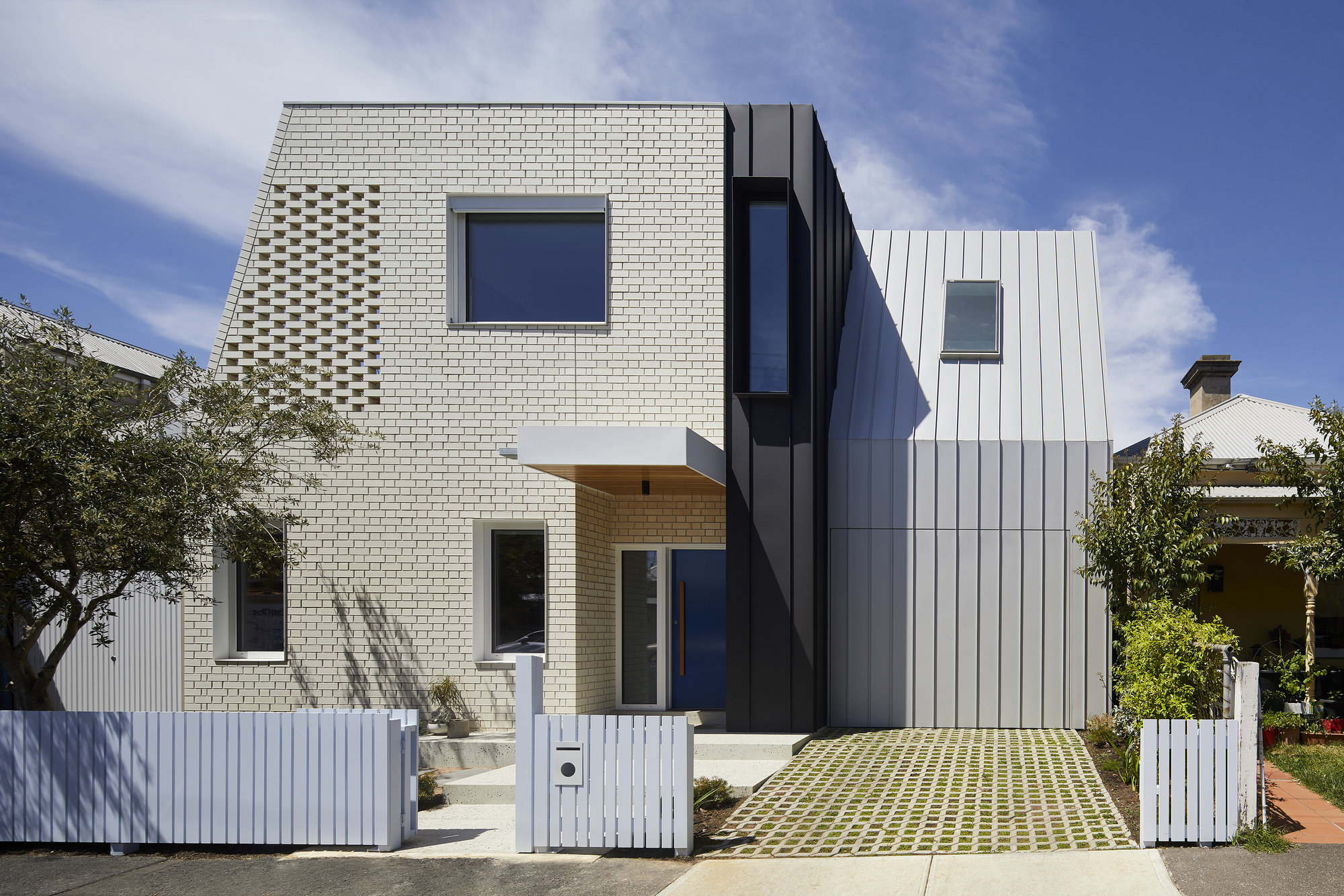 A Sustainable Contemporary Home with Warm Interiors for a Young Family in Melbourne, Australia by Poly Studio (1)