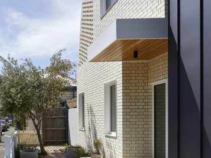 A Sustainable Contemporary Home with Warm Interiors for a Young Family in Melbourne, Australia by Poly Studio (3)