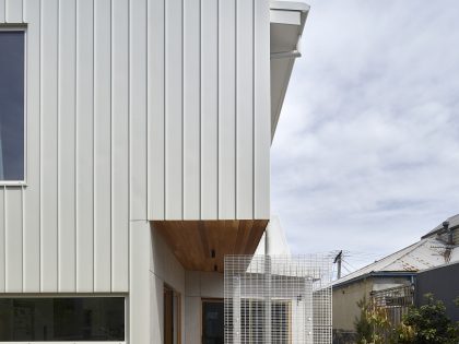 A Sustainable Contemporary Home with Warm Interiors for a Young Family in Melbourne, Australia by Poly Studio (4)