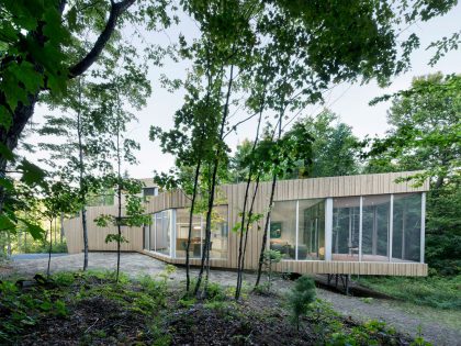 A Sustainable Family Lake House Surrounded by Lush Woods on Lac Grenier by Paul Bernier Architecte (1)