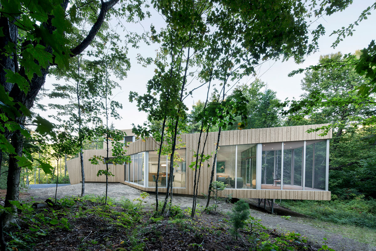 A Sustainable Family Lake House Surrounded by Lush Woods on Lac Grenier by Paul Bernier Architecte (1)