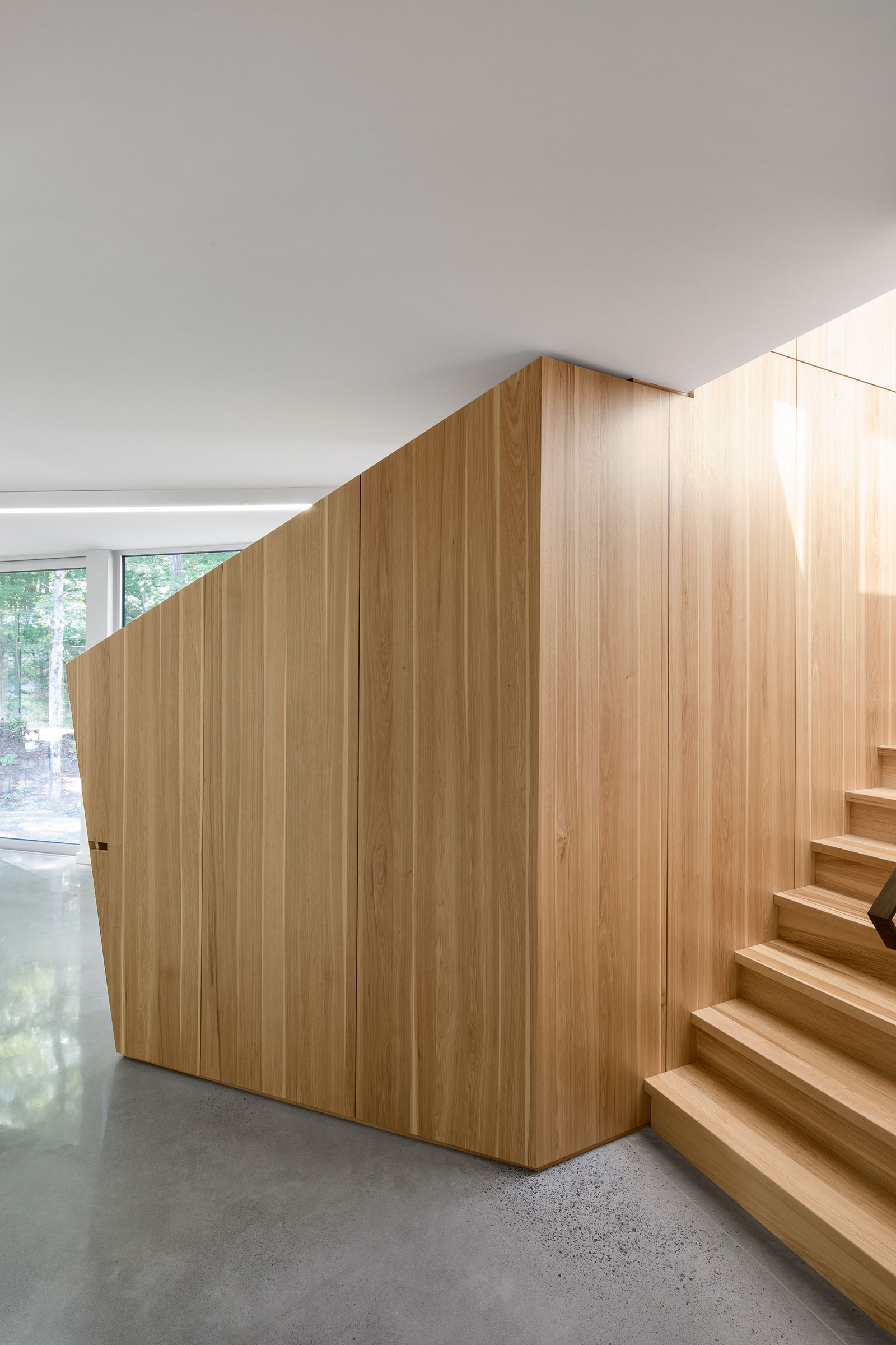 A Sustainable Family Lake House Surrounded by Lush Woods on Lac Grenier by Paul Bernier Architecte (11)