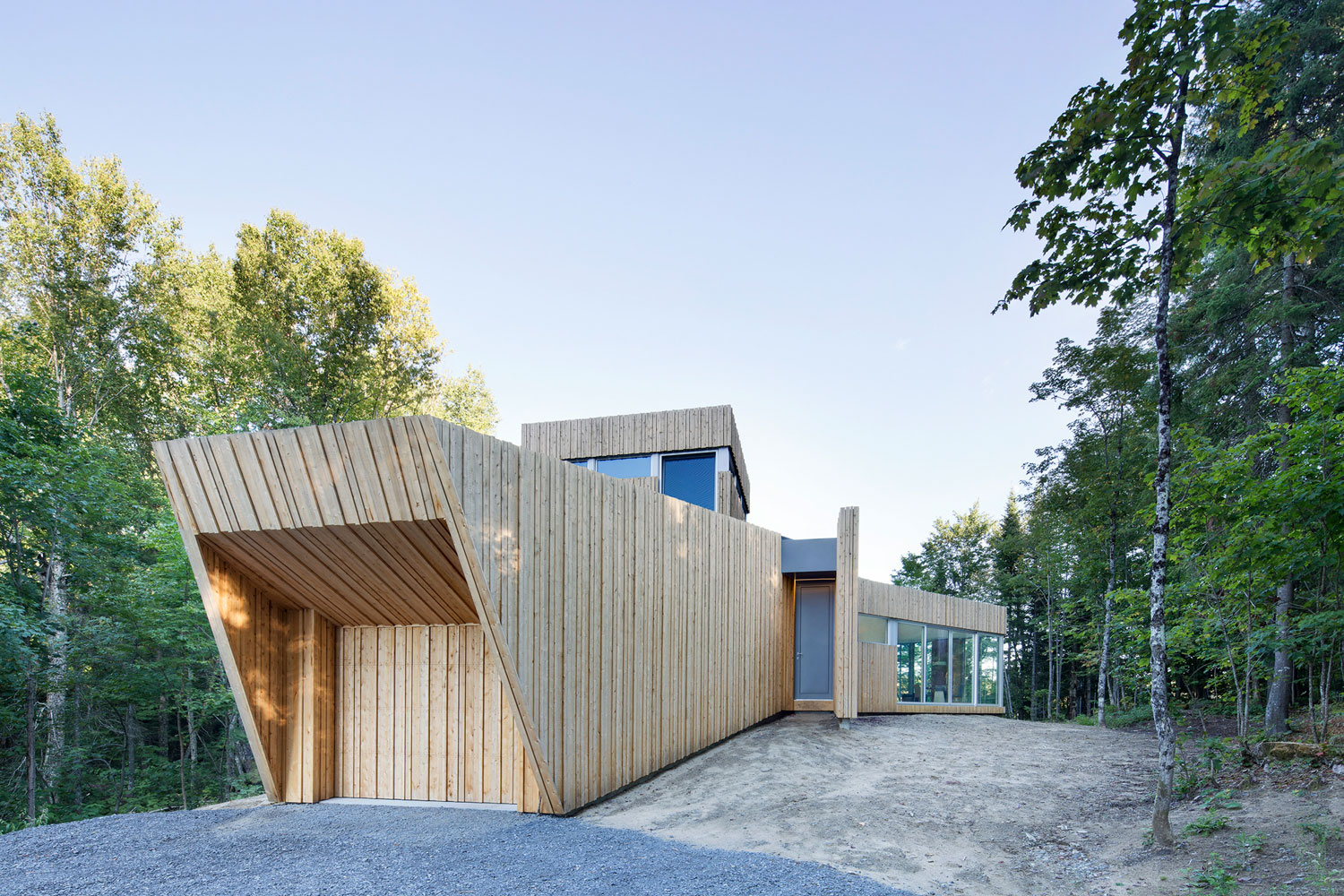A Sustainable Family Lake House Surrounded by Lush Woods on Lac Grenier by Paul Bernier Architecte (3)