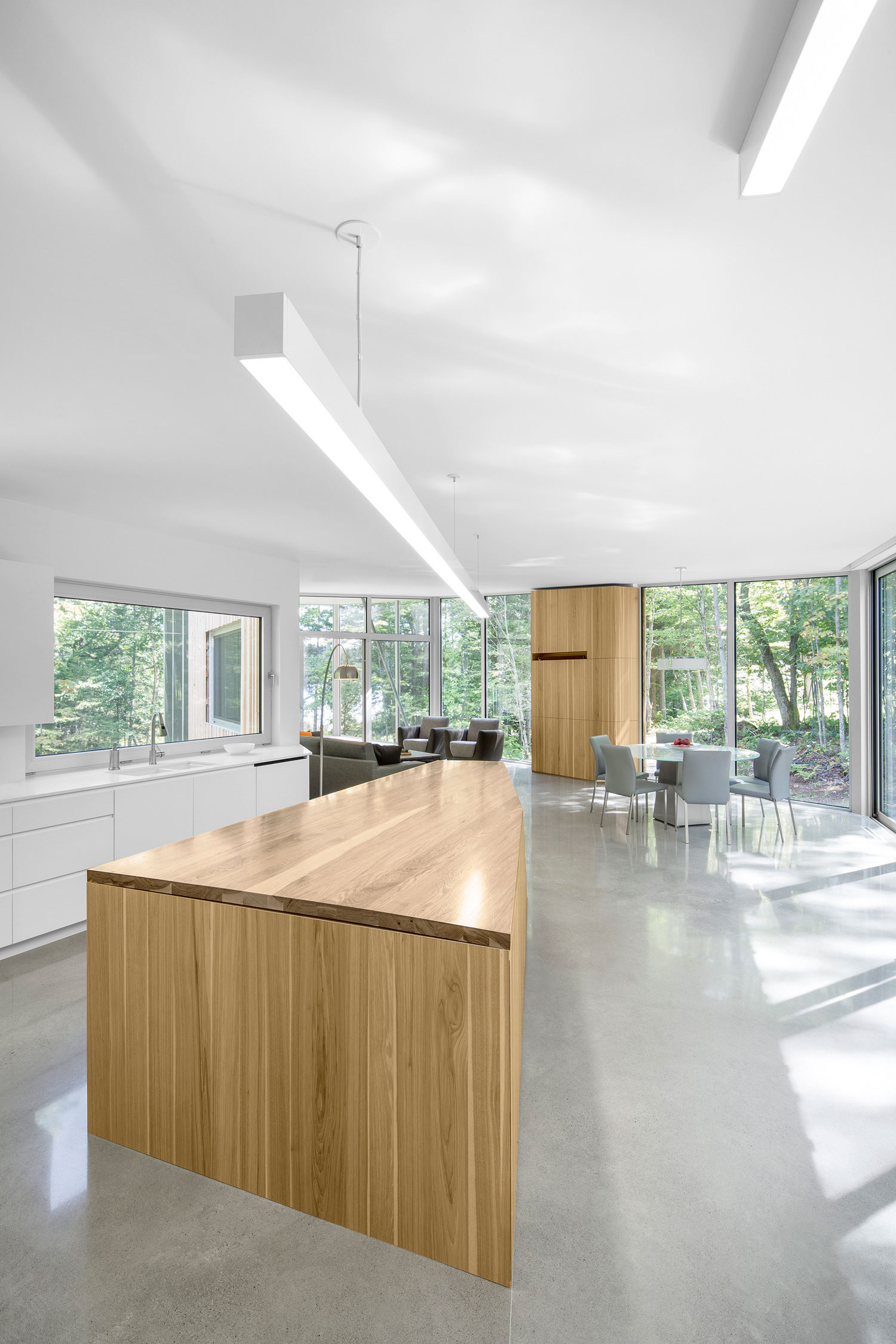 A Sustainable Family Lake House Surrounded by Lush Woods on Lac Grenier by Paul Bernier Architecte (9)