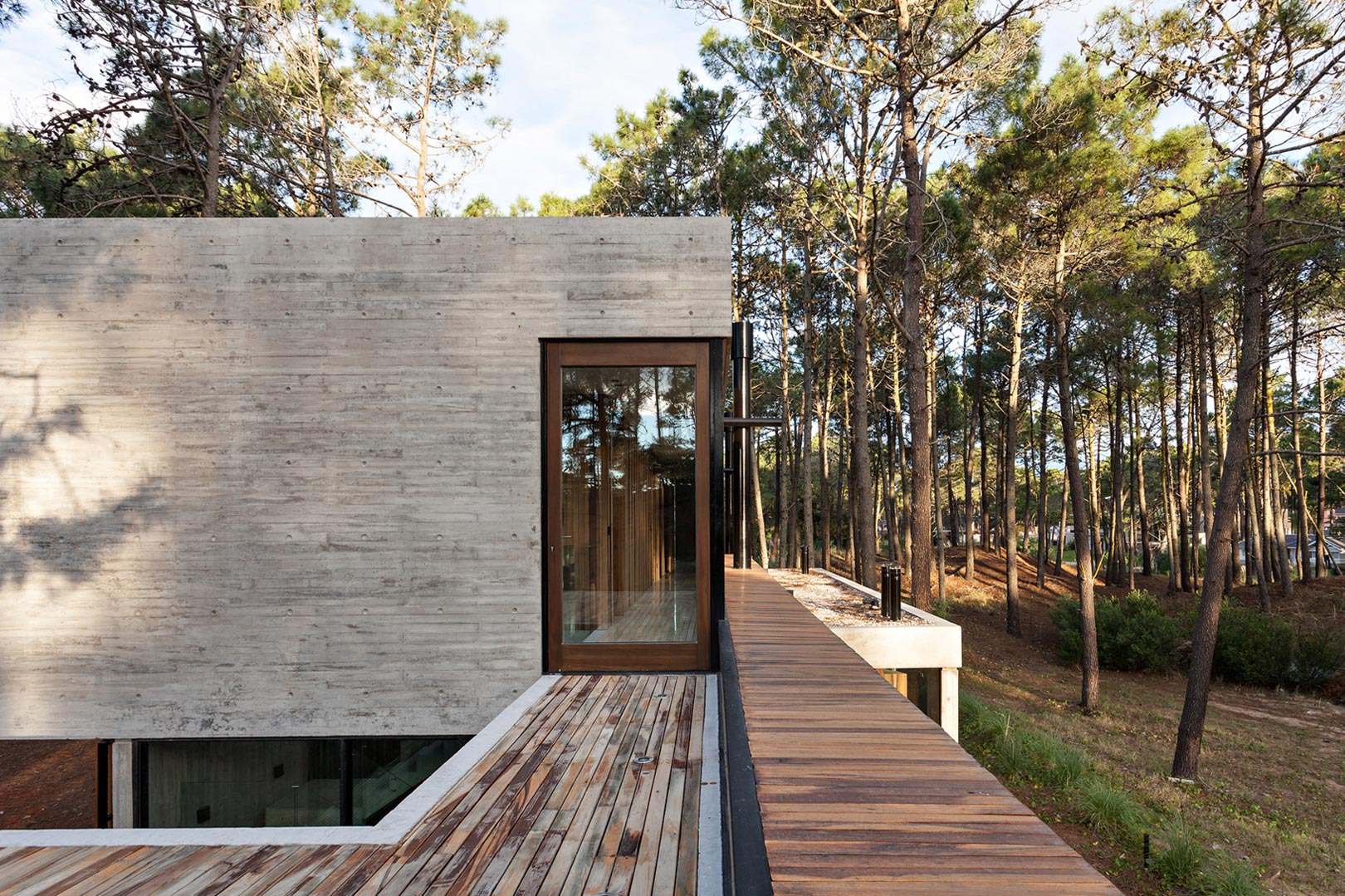 An Elegant Concrete and Glass House in the Forest of Pinamar, Argentina by ATV arquitectos (2)