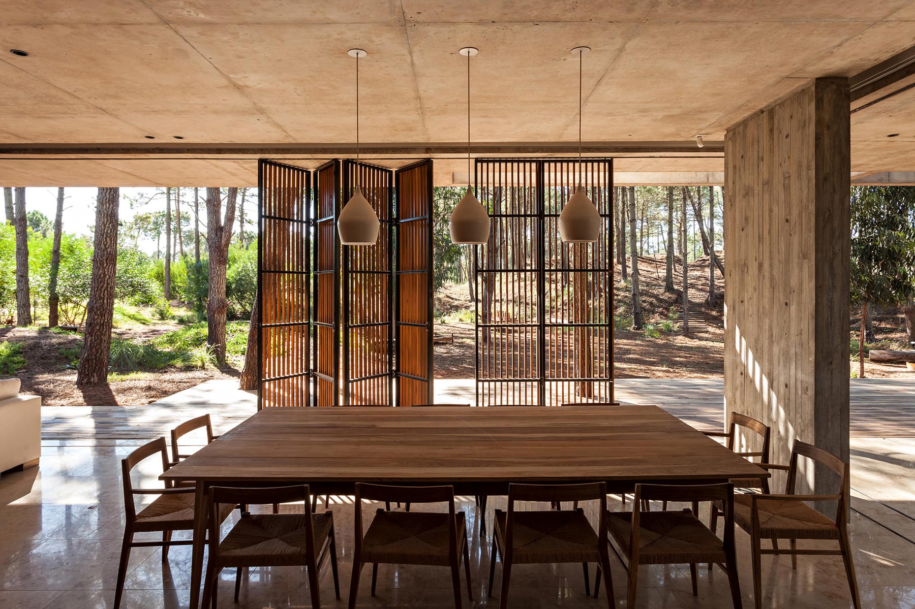 An Elegant Concrete and Glass House in the Forest of Pinamar, Argentina by ATV arquitectos (6)