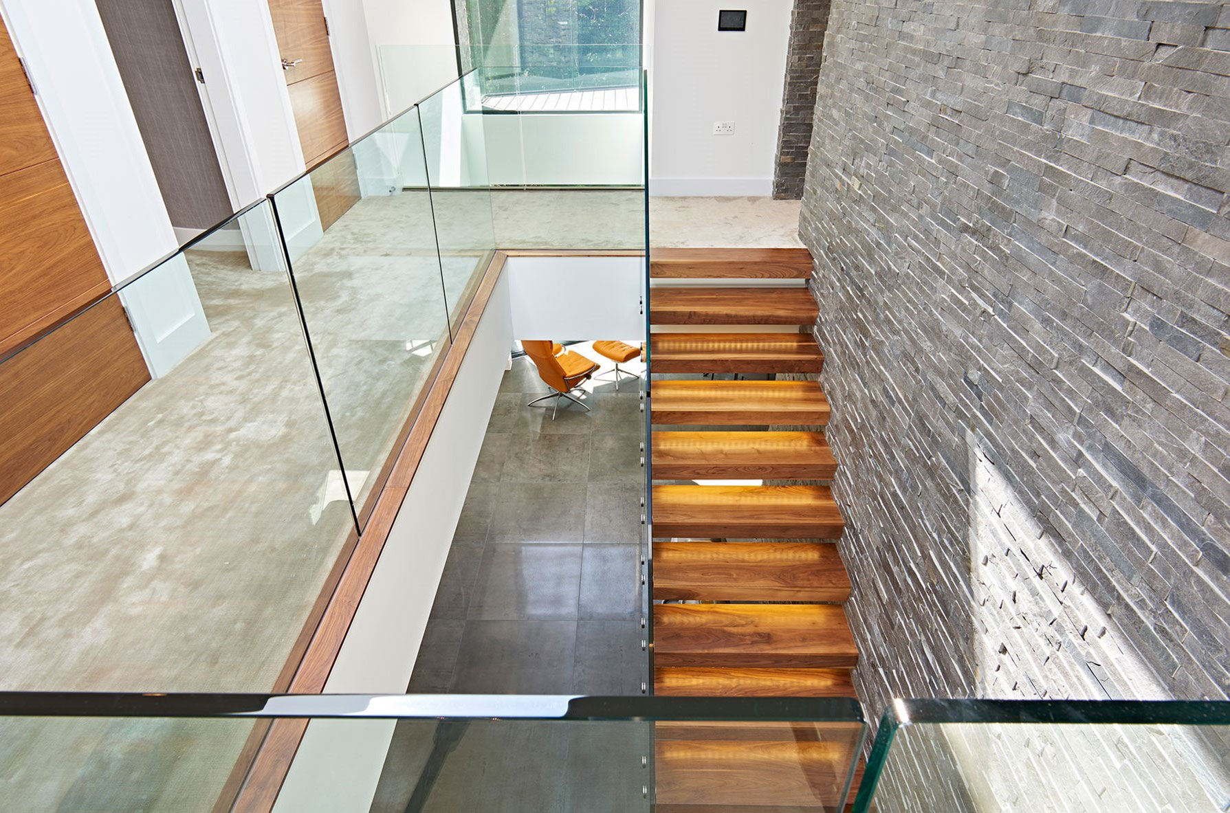 An Elegant Contemporary Home with Strong Contrast and Iroko Timber in Canford Cliffs by David James Architects (18)