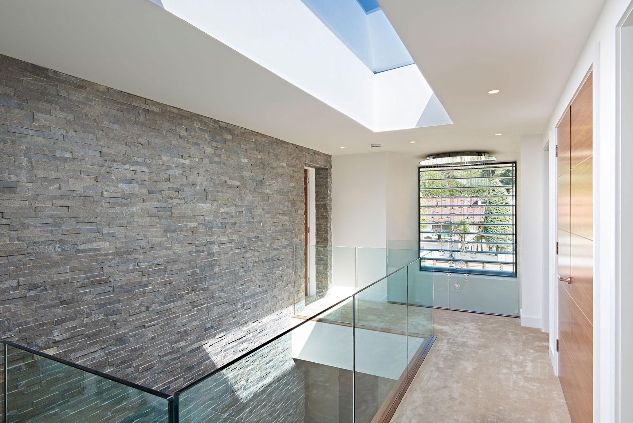 An Elegant Contemporary Home with Strong Contrast and Iroko Timber in Canford Cliffs by David James Architects (19)