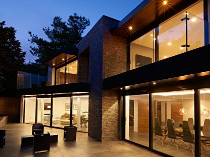 An Elegant Contemporary Home with Strong Contrast and Iroko Timber in Canford Cliffs by David James Architects (24)