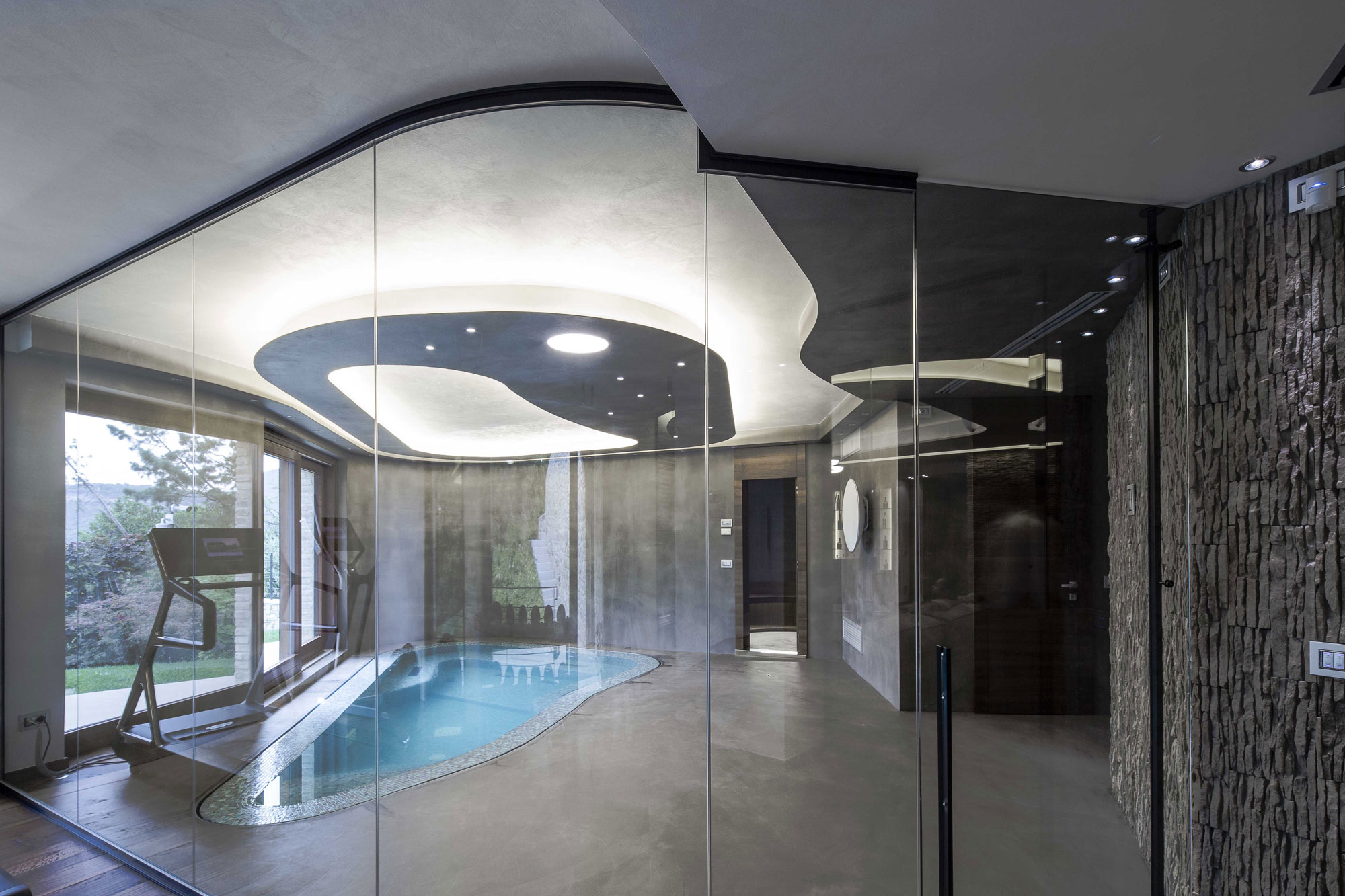 An Elegant Contemporary Home with an Indoor and Outdoor Pool in Perugia by Giammetta Architects (18)