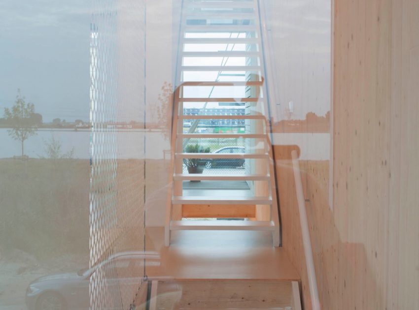 An Elegant Home with Wide Windows and Steel-Framed Balconies in Amsterdam by MEESVISSER (10)
