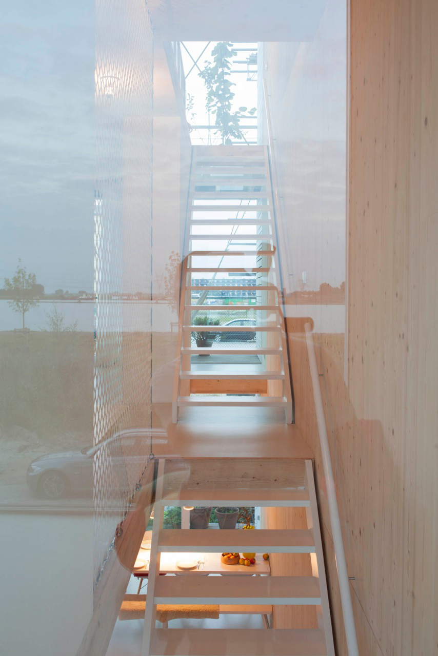 An Elegant Home with Wide Windows and Steel-Framed Balconies in Amsterdam by MEESVISSER (10)