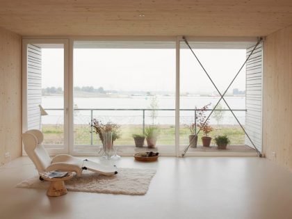 An Elegant Home with Wide Windows and Steel-Framed Balconies in Amsterdam by MEESVISSER (2)