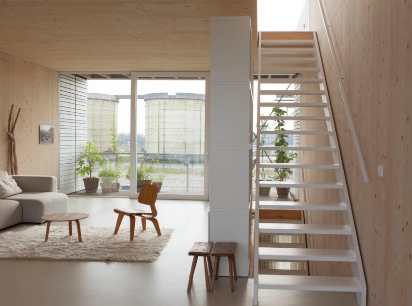 An Elegant Home with Wide Windows and Steel-Framed Balconies in Amsterdam by MEESVISSER (4)