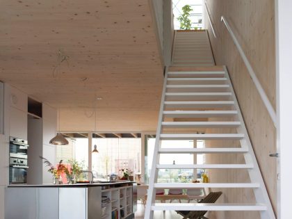 An Elegant Home with Wide Windows and Steel-Framed Balconies in Amsterdam by MEESVISSER (5)