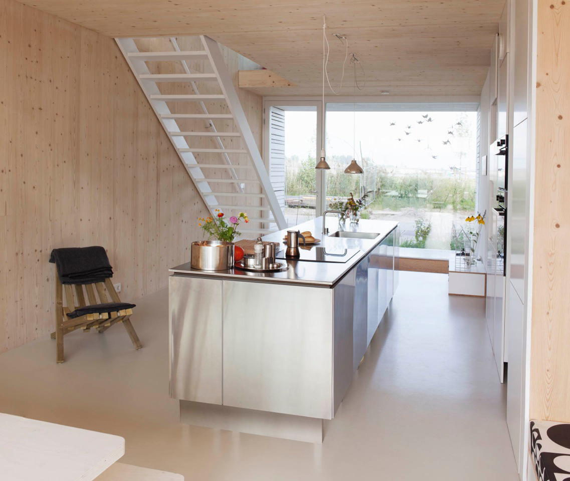 An Elegant Home with Wide Windows and Steel-Framed Balconies in Amsterdam by MEESVISSER (6)