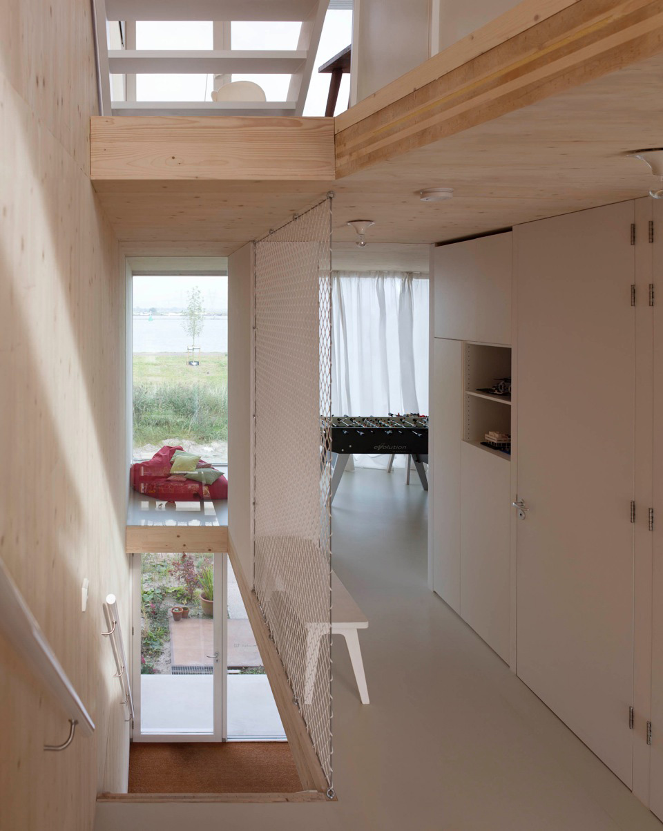 An Elegant Home with Wide Windows and Steel-Framed Balconies in Amsterdam by MEESVISSER (9)