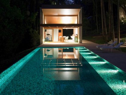 An Elegant House with Swimming Pool Surrounded by Dense Vegetation in São Paulo by Vasco Lopes Arquitetura (17)