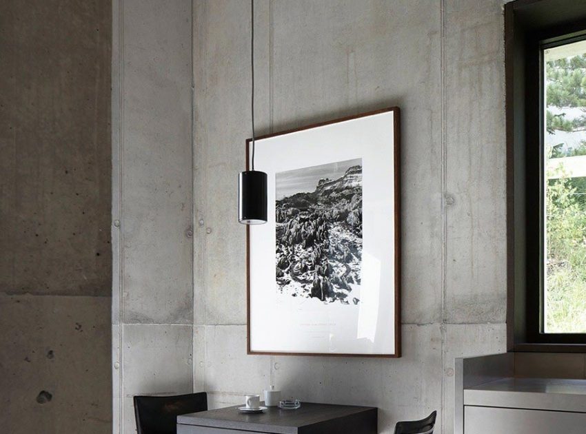 An Elegant Modern Concrete Home in Zuoz, Switzerland by Men Duri Arquint (7)