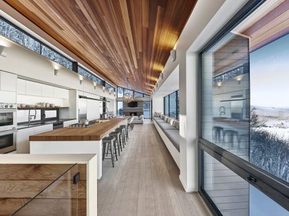 An Elegant Modern Ski Chalet Surrounded by the Forest of Lac Archambault by Robitaille Curtis (5)