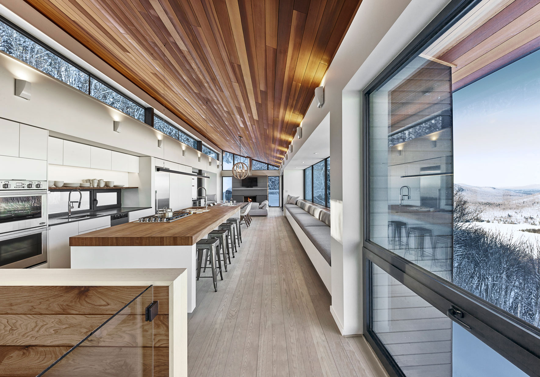 An Elegant Modern Ski Chalet Surrounded by the Forest of Lac Archambault by Robitaille Curtis (5)