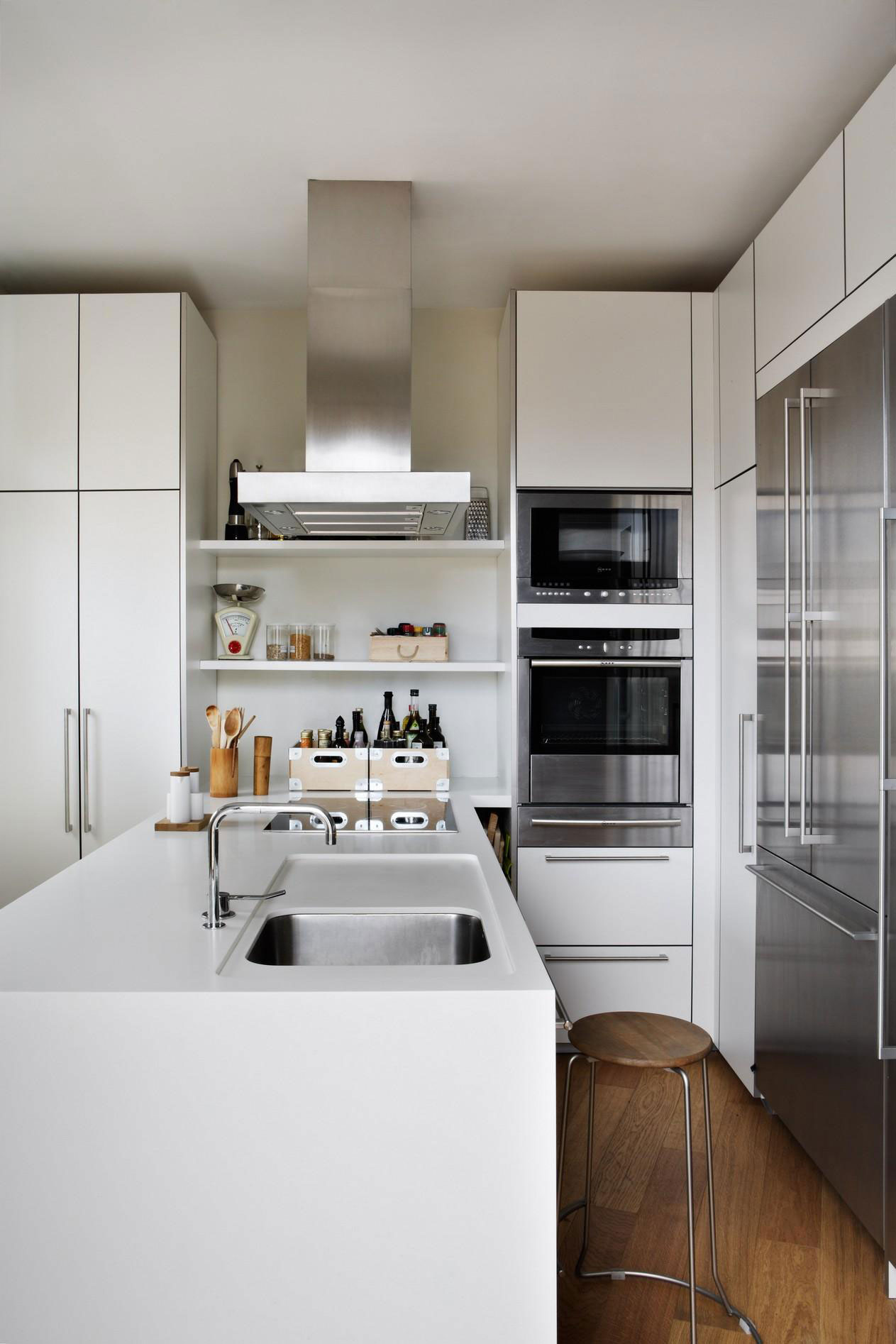 An Elegant and Warm Penthouse with Open Spaces and Functional Interior in Rosales by ÁBATON (3)