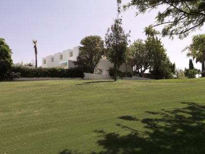 A Beautiful White Modern Home with an Internal Courtyard Surrounded by Perforated Walls in Marbella by Gus Wüstemann Architects (1)