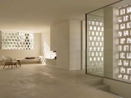 A Beautiful White Modern Home with an Internal Courtyard Surrounded by Perforated Walls in Marbella by Gus Wüstemann Architects (12)