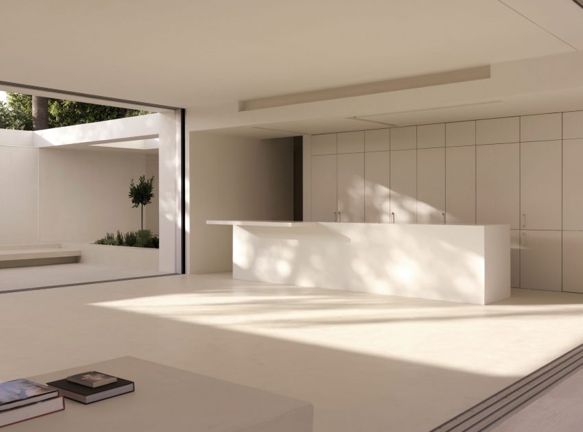 A Beautiful White Modern Home with an Internal Courtyard Surrounded by Perforated Walls in Marbella by Gus Wüstemann Architects (13)