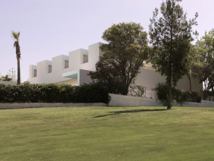 A Beautiful White Modern Home with an Internal Courtyard Surrounded by Perforated Walls in Marbella by Gus Wüstemann Architects (2)