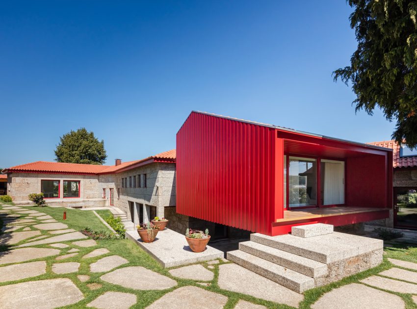 A Beautiful and Bright Red House Overlooks a Stunning Landscape in Vila Nova de Famalicão, Portugal by NOARQ (1)