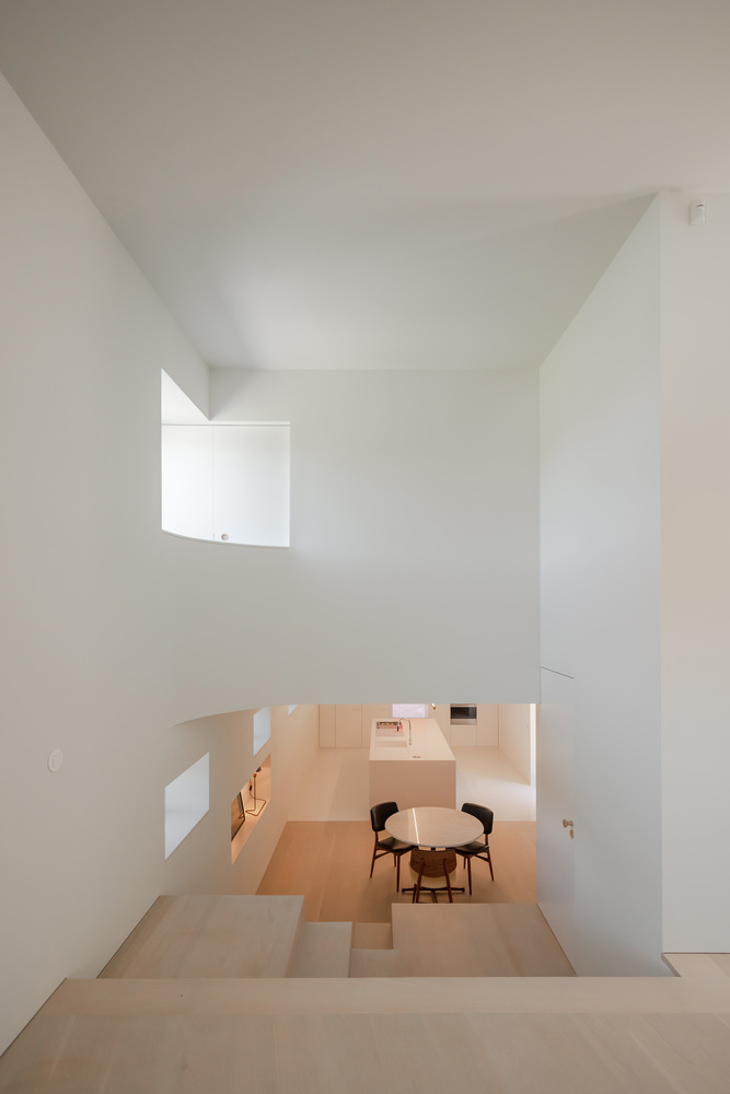 A Beautiful and Bright Red House Overlooks a Stunning Landscape in Vila Nova de Famalicão, Portugal by NOARQ (14)