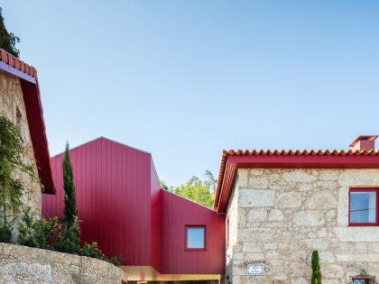 A Beautiful and Bright Red House Overlooks a Stunning Landscape in Vila Nova de Famalicão, Portugal by NOARQ (2)