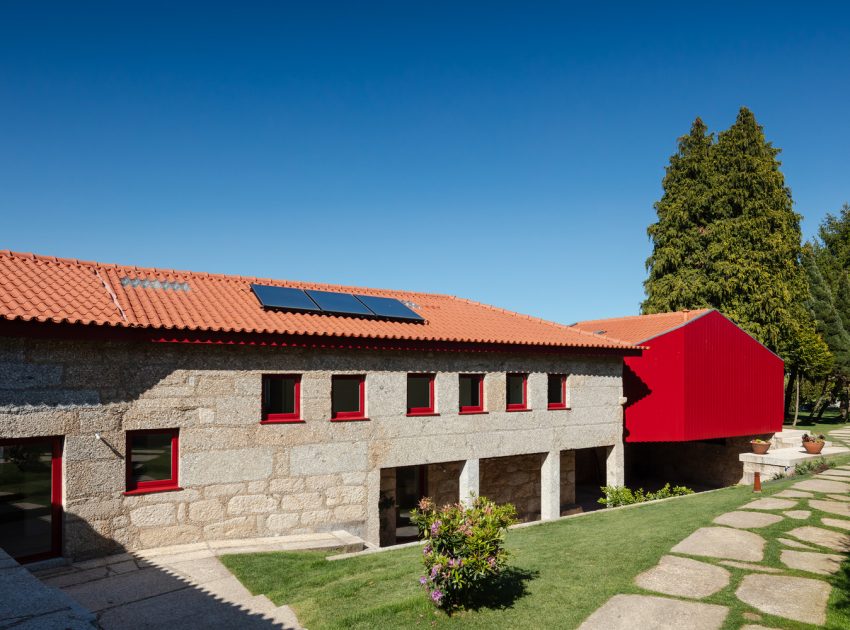 A Beautiful and Bright Red House Overlooks a Stunning Landscape in Vila Nova de Famalicão, Portugal by NOARQ (3)