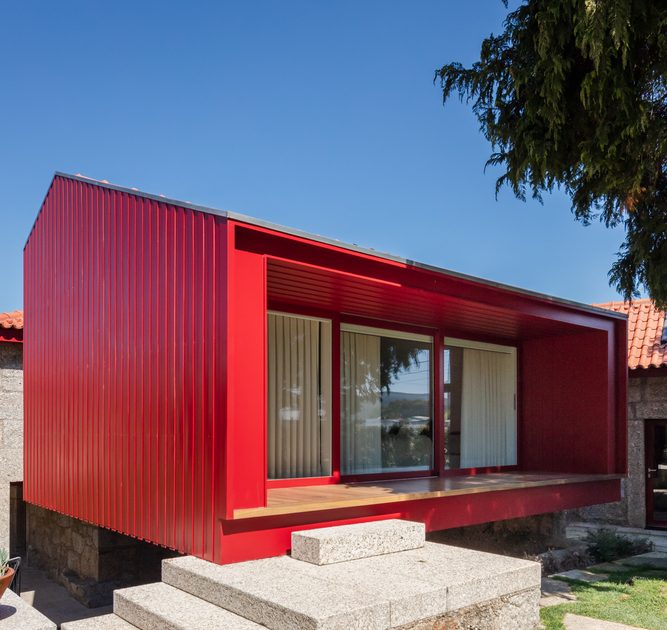 A Beautiful and Bright Red House Overlooks a Stunning Landscape in Vila Nova de Famalicão, Portugal by NOARQ (4)
