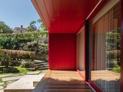 A Beautiful and Bright Red House Overlooks a Stunning Landscape in Vila Nova de Famalicão, Portugal by NOARQ (5)