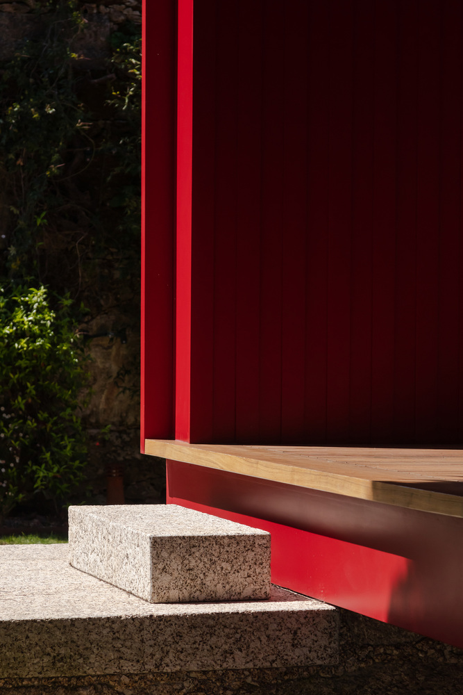 A Beautiful and Bright Red House Overlooks a Stunning Landscape in Vila Nova de Famalicão, Portugal by NOARQ (6)