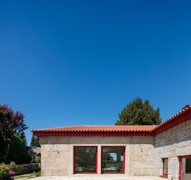 A Beautiful and Bright Red House Overlooks a Stunning Landscape in Vila Nova de Famalicão, Portugal by NOARQ (7)