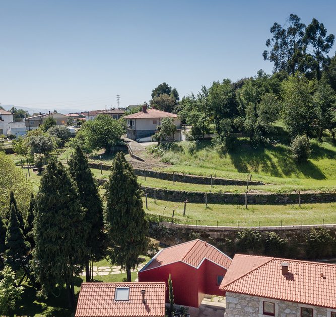 A Beautiful and Bright Red House Overlooks a Stunning Landscape in Vila Nova de Famalicão, Portugal by NOARQ (8)