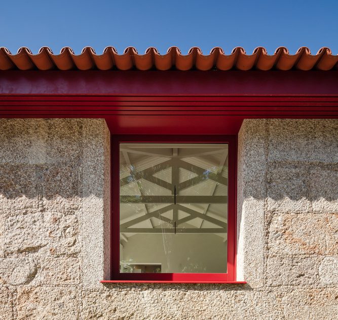 A Beautiful and Bright Red House Overlooks a Stunning Landscape in Vila Nova de Famalicão, Portugal by NOARQ (9)