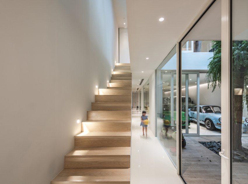 A Bright Contemporary Home for an Avid Car Collector in Bangkok by BROWNHOUSES Company Limited (15)