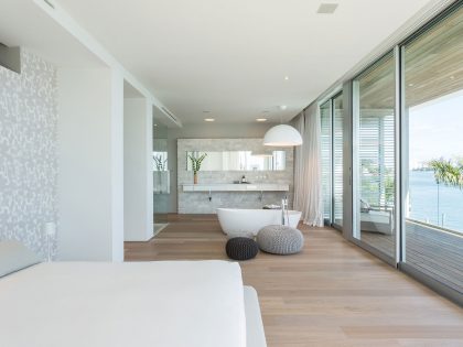 A Bright Modern Concrete Home with Beautiful and Transparent Arrangement on Biscayne Bay by [STRANG] Architecture (23)