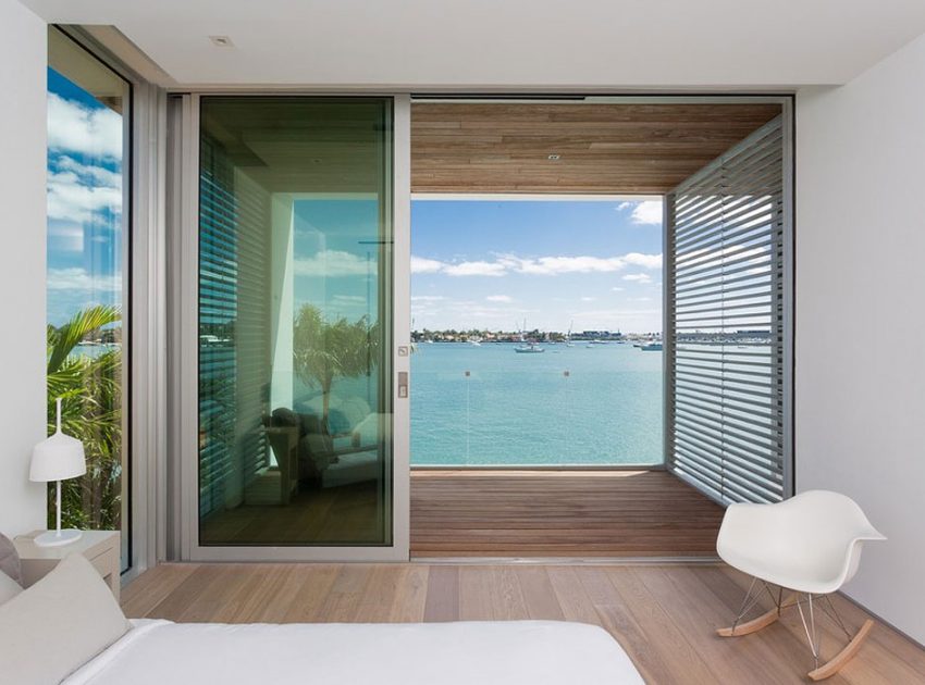 A Bright Modern Concrete Home with Beautiful and Transparent Arrangement on Biscayne Bay by [STRANG] Architecture (28)