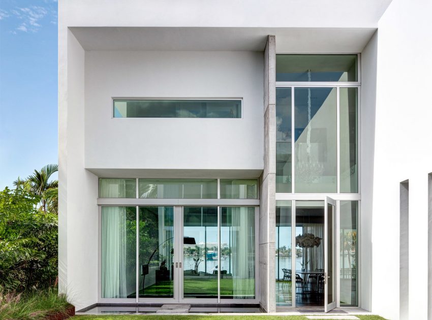 A Bright Modern Concrete Home with Beautiful and Transparent Arrangement on Biscayne Bay by [STRANG] Architecture (6)